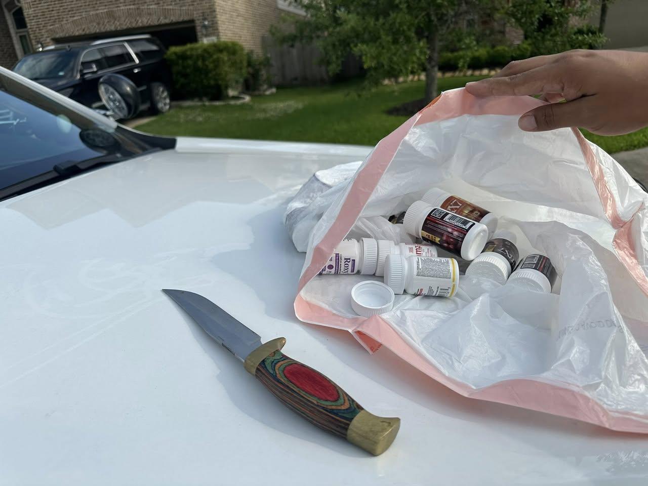 Harris County Constable Precinct 4 evidence photo: the knife used in the robbery and recovered ROXY, RX7, and 7Tabz brand concentrated synthetic 7-OH products.